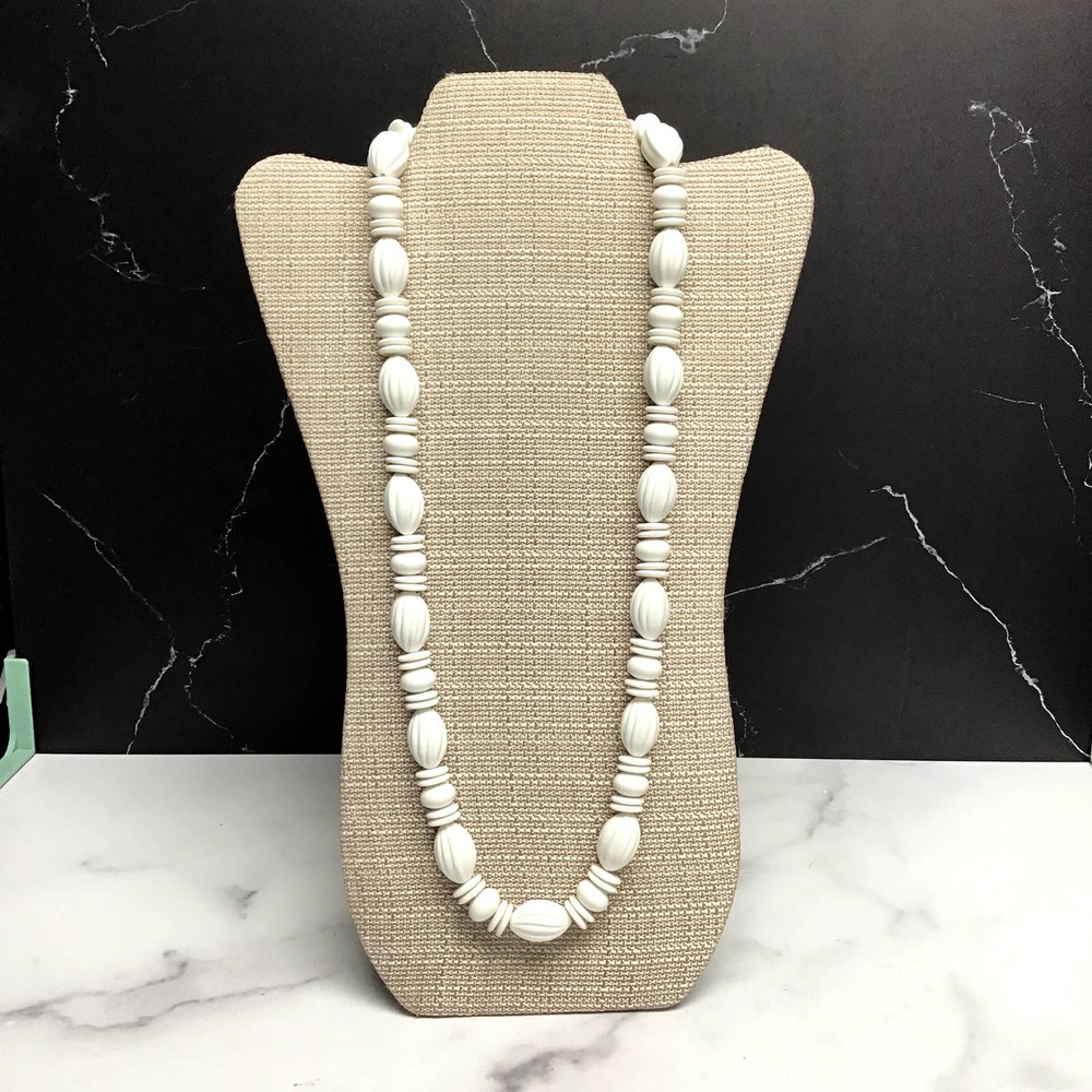 Single strand vintage white bead necklace with twist clasp